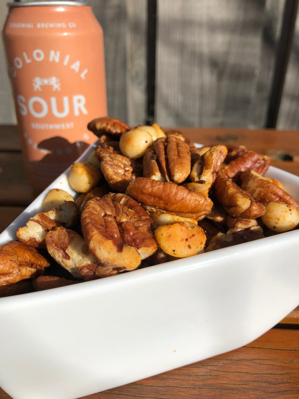 Coast n Smoke seasoned nuts and a can of beer