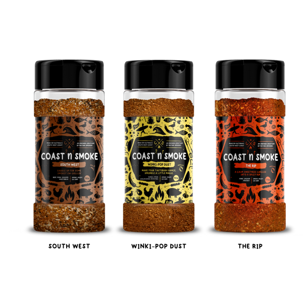 The pork rub bundle from coast n smoke, 3 rubs with a brown, yellow and orange label