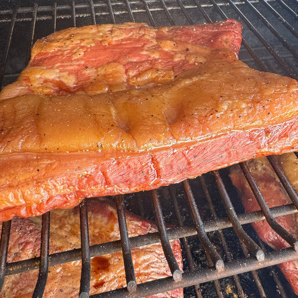juicy bacon being smoked
