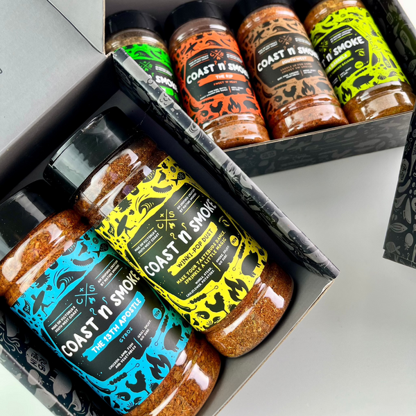 a 2 pack gift box in the foreground with 2 BBQ seasonings and a 4 pack in the background