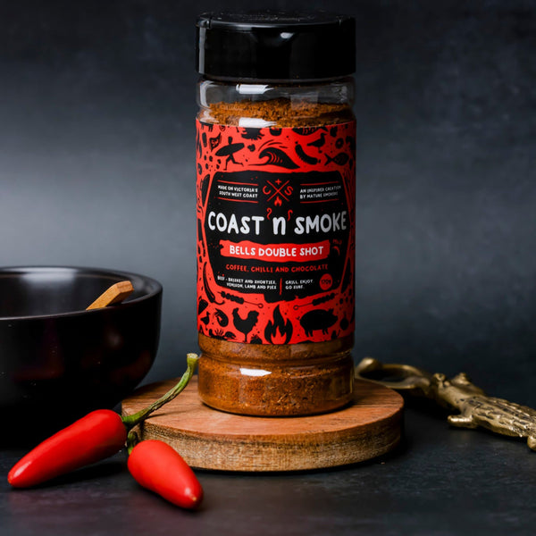 A jar of Bells Double shot coffee rub with a bowl and red chilli next to it