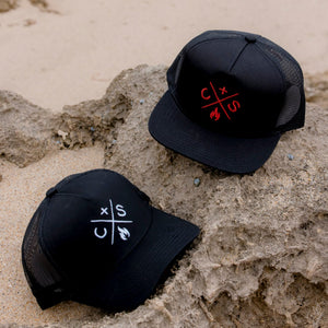 both style of coast n smoke hat on the beach