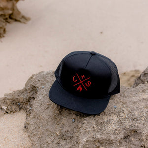 trucker cap on the beach