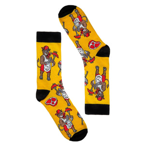 Yellow socks with cartoon bear design on a white background