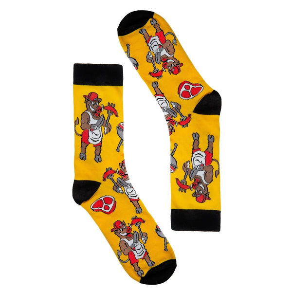 Yellow socks with cartoon bear design on a white background