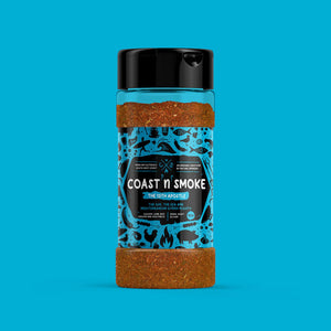 Greek seasoning called The 13th Apostle on a blue background matching its blue label with surfy and BBQ icons