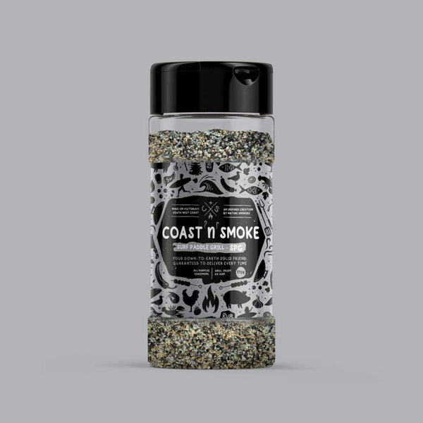 A shaker of salt pepper garlic on a grey background that matches the label colour