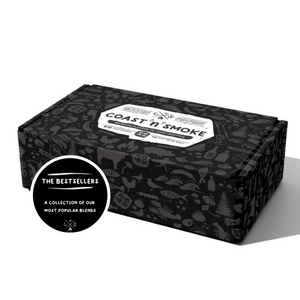 Gift box with surf and barbecue icons. Black with grey icons and white logo in centre of box lid